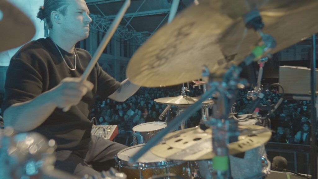 Photo of Gareth Grover on drums performing Higher Drums with United Freedom Collective at teh Alexandra Palace venue